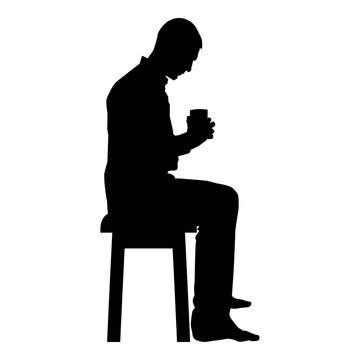 Man holding mug and looking at the contents inside while sitting on stool Concept of calm and home comfort icon black color vector illustration flat style image