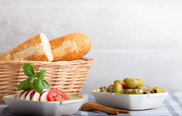 mozzarella with tomatoes and olives