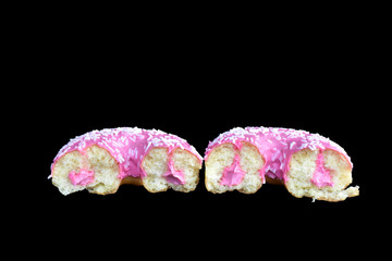 pink donut on a black background, 