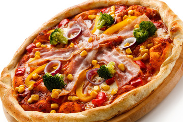 Pizza with bacon and vegetables on cutting board on white background