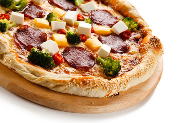 Pizza with salmi and feta cheese and vegetables on white background