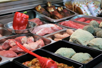 Variety of meat products in the butchery