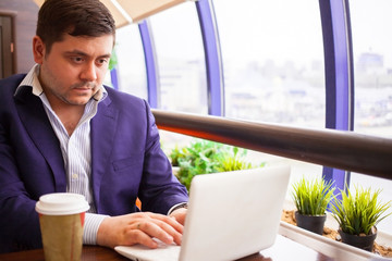 businessman check his email on the computer