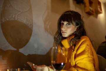 portrait of beauty young woman with red wine 