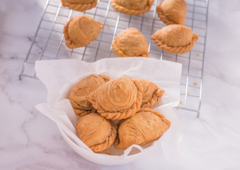 Curry puff pastry, snack curry puff, locally known as karipap