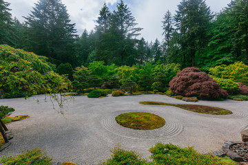 Sand garden among trees at Portland Japanese Garden, Portland, USA