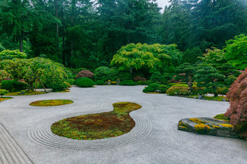 Sand garden among trees at Portland Japanese Garden, Portland, USA
