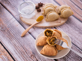 Curry puff pastry, snack curry puff, locally known as karipap