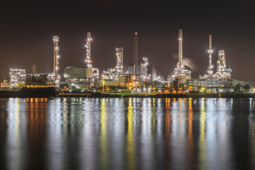 Fototapeta na wymiar Bangchak Oil Refinery, a view of oil refinery along Chaopraya river, Phra Khanong District, Bangkok.