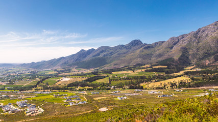 Fototapeta na wymiar Franschhoek valley with its famous wineries and surrounding mountains, South Africa