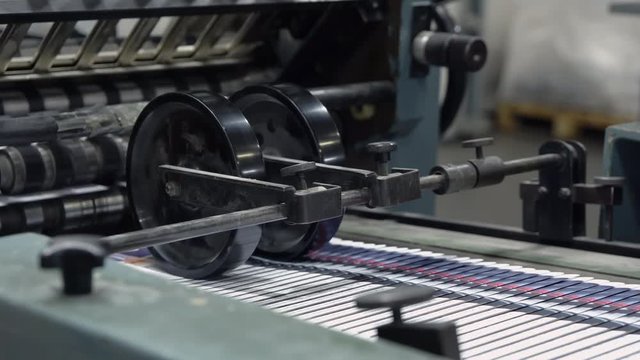 equipment print factory conveyor belt in a printing press