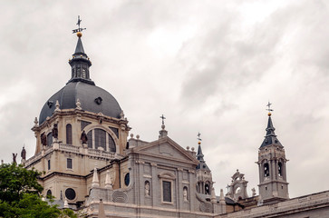 Fototapeta na wymiar Almudena Cathedral in Madrid in neoclassical style on a sunny day