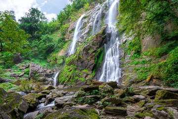 Fototapeta na wymiar Khlong Lan waterfall is a beautiful Waterfalls in the rain forest jungle Thailand
