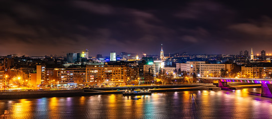 Novi Sad, Serbia - January 01, 2019: Panorama of Novi Sad and Danube river at night