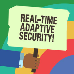 Handwriting text writing Real Time Adaptive Security. Concept meaning accommodate the emergence of multiple perimeters Hu analysis Hand Holding Blank Colored Placard with Stick photo Text Space