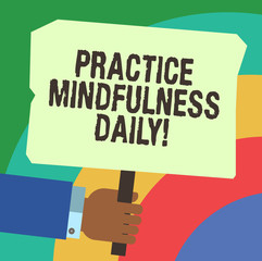 Handwriting text writing Practice Mindfulness Daily. Concept meaning Cultivating focus awareness on the present Hu analysis Hand Holding Blank Colored Placard with Stick photo Text Space