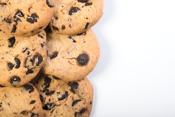 Chocolate cookies at the white background with a breaking trace.