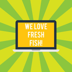 Conceptual hand writing showing We Love Fresh Fish. Business photo showcasing Seafood lovers healthy food marine cooking culinary arts Laptop Monitor Personal Computer Tablet Screen Text Space