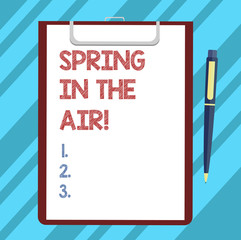 Text sign showing Spring In The Air. Conceptual photo Natural feeling beautiful season flowers everywhere Blank Sheet of Bond Paper on Clipboard with Click Ballpoint Pen Text Space