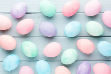 Pastel Easter eggs background. Spring greating card.
