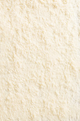 Grated parmesan cheese background from above.