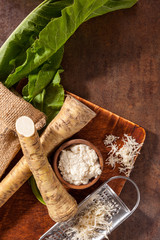 Fresh and grated horseradish. © Eskymaks