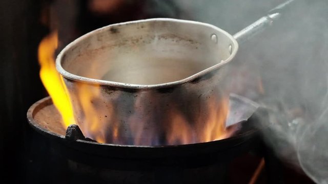 Pot warming on a fire 120 fps