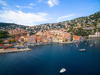 View of luxury resort Villefranche-sur-Mer and bay on French Riviera at Mediterranean Sea. Cote...