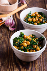 Spinach with chickpeas salad bowl