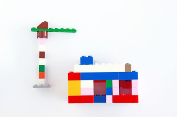building a house with a crane, scenery with children blocks