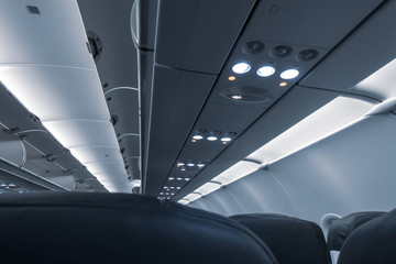 Overhead compartment of commercial airplane cabin
