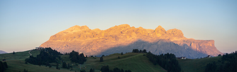 Great landscape to the Dolomites in Italy. Summer sunrise at Sella mountain range