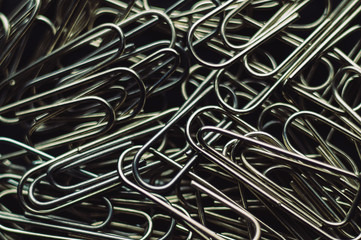 Paper clips on black background