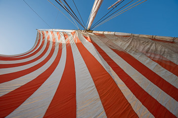 Abstract view of striped cloth sail on boat