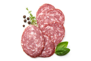 Thinly Sliced Salami with basil and pepper, isolated on a white background. Close-up