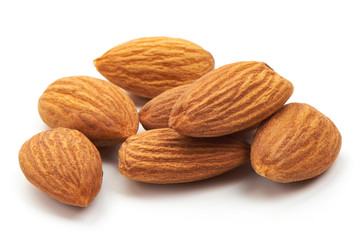Closeup of almonds, isolated on a white background