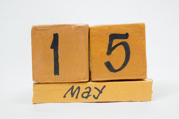 may 15th. Day 15 of month, handmade wood calendar isolated on white background. Spring month, day of the year concept