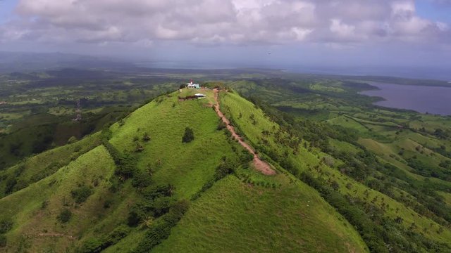 mountain panorama background peak forest rock view green landscape / Top view from sky to road. Climb path mountains rock meadow. Sunrise summer expedition mountain field