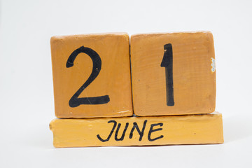 june 21st. Day 20 of month, handmade wood calendar isolated on white background. summer month, day of the year concept