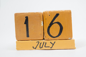 july 16th. Day 16 of month, handmade wood calendar isolated on white background. summer month, day of the year concept