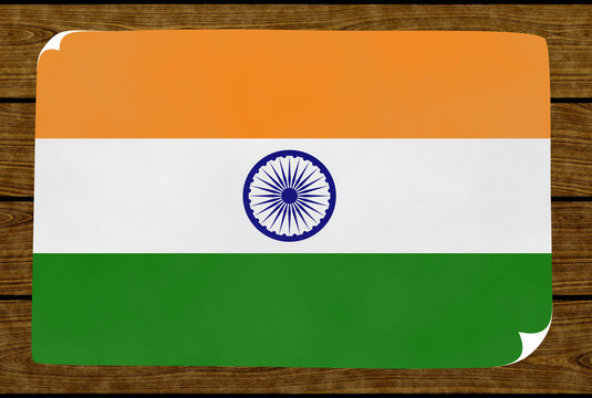 Illustration of an Indiian flag painted on the papier pasted on the woody wall