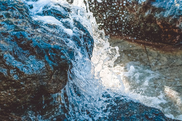 Strong water flow from the summer fountain in the old city of Shtuttgard, Germany.