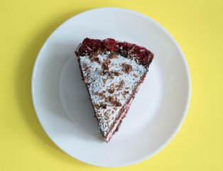 Cake slice top view on background.
