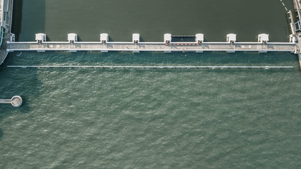 Aerial view of dam in singapore. Where fesh water vs. brine / Save fresh water / Construction Technology / Emgineering Design