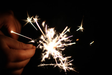 Children are playing fireworks as a beautiful light. 