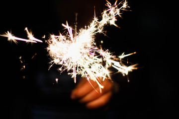 Children are playing fireworks as a beautiful light. 