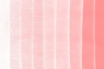 Elegant red textile background. Silk cloth texture. Fabric pattern.