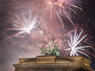 Fireworks over the Brandenburg Gate in Berlin, Germany,  during New Year concert and celebrations. © Dziurek