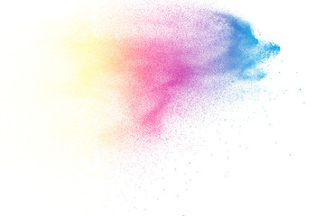 Abstract color powder explosion on white background.Freeze motion of dust splash. Painted Holi in festival.