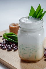 Cendol / Cendol is an iced sweet dessert that contains droplets of worm-like green rice flour jelly, coconut milk and palm sugar syrup. 